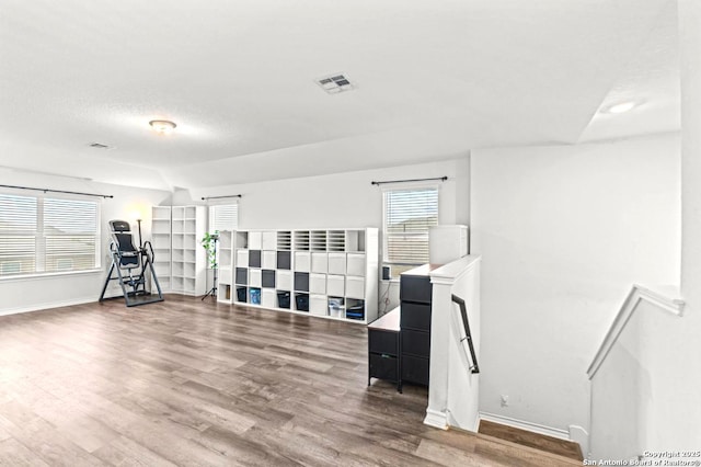 324 Washita Riv, Cibolo, TX 78108 - exercise room featuring wood finished floors and baseboards