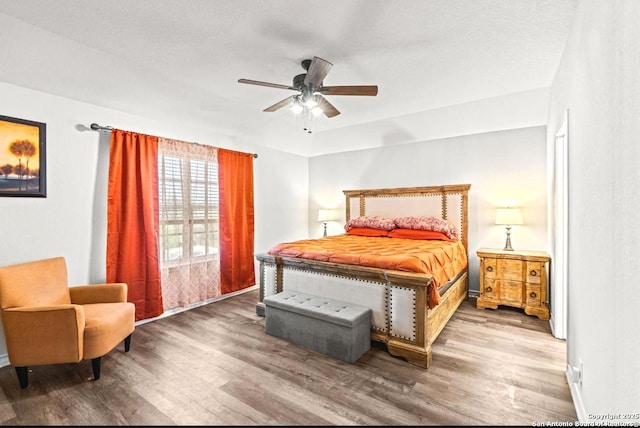 324 Washita Riv, Cibolo, TX 78108 - bedroom with wood finished floors and ceiling fan