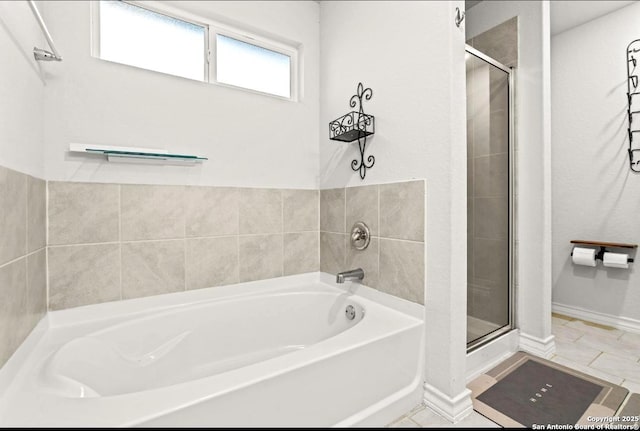 324 Washita Riv, Cibolo, TX 78108 - full bathroom with a garden tub, a stall shower, and baseboards
