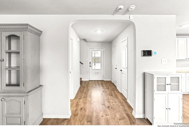 324 Washita Riv, Cibolo, TX 78108 - hall with light wood-style flooring and baseboards