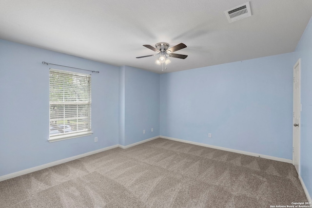18719 Needle Rock, San Antonio, TX 78258 - spare room featuring a ceiling fan, carpet floors, and baseboards