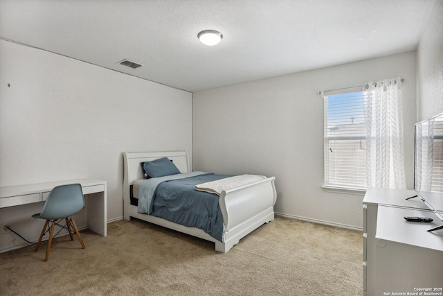 13508 Ashmont, Live Oak, TX 78233 - bedroom featuring light carpet and a desk
