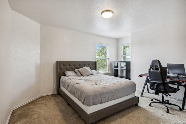 13508 Ashmont, Live Oak, TX 78233 - carpeted bedroom with a desk, baseboards, and a textured ceiling
