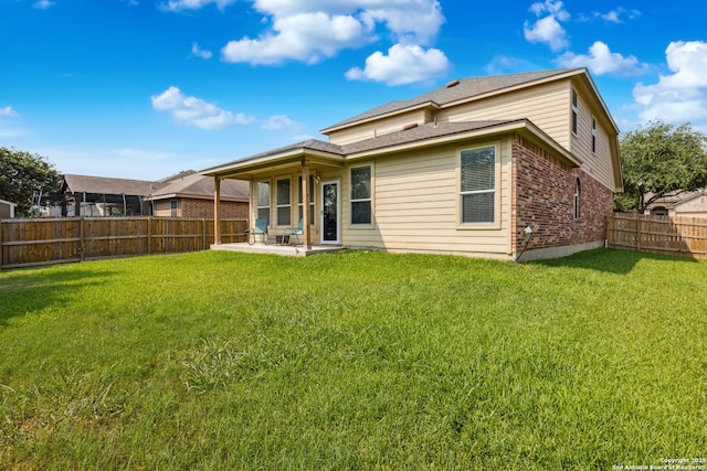 13508 Ashmont, Live Oak, TX 78233 - rear view of house with brick siding and a patio