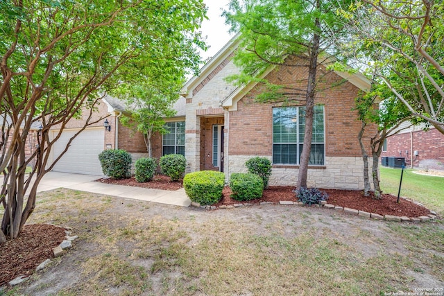 12406 Prince Solms, San Antonio, TX 78253 - traditional home with brick siding, a garage, a front yard, stone siding, and central air condition unit