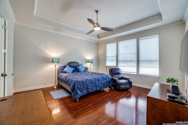 12406 Prince Solms, San Antonio, TX 78253 - bedroom featuring a raised ceiling, dark wood finished floors, baseboards, ornamental molding, and a ceiling fan