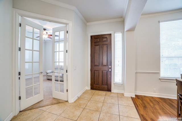 12406 Prince Solms, San Antonio, TX 78253 - foyer entrance with french doors, ornamental molding, a ceiling fan, light tile patterned floors, and baseboards