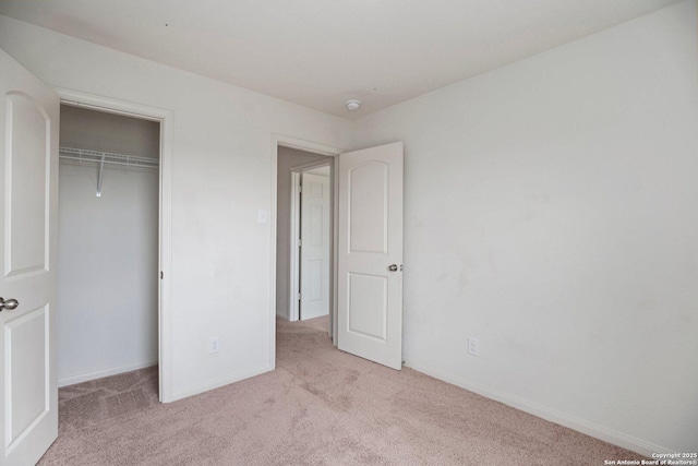11042 Eyelet Hbr, Converse, TX 78109 - unfurnished bedroom with light colored carpet, a closet, and baseboards