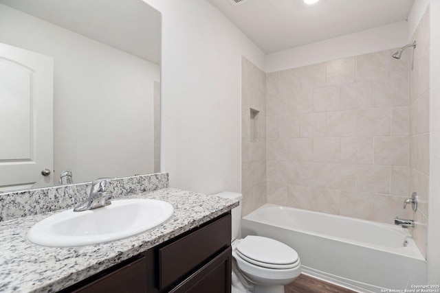 11042 Eyelet Hbr, Converse, TX 78109 - full bath with toilet, vanity, tub / shower combination, and wood finished floors
