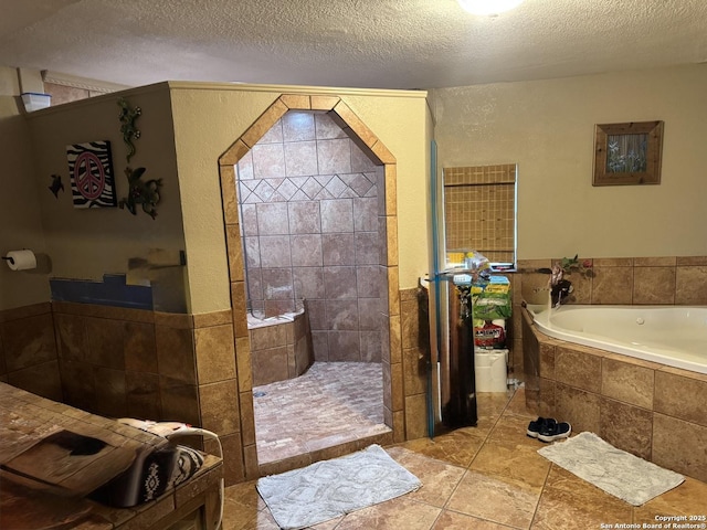 7084 Richter, Elmendorf, TX 78112 - full bathroom with a bath, a textured ceiling, and walk in shower