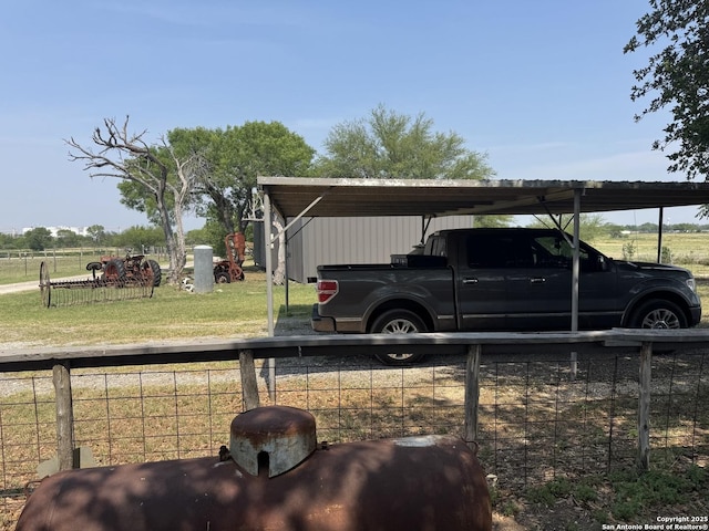 7084 Richter, Elmendorf, TX 78112 - view of parking / parking lot with a detached carport