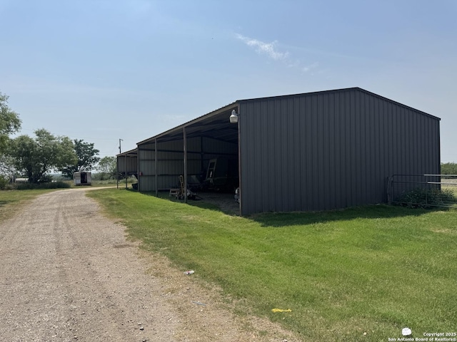 7084 Richter, Elmendorf, TX 78112 - view of pole building with driveway