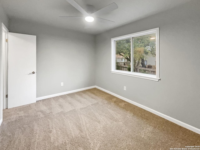 6218 Ridge Oak, San Antonio, TX 78250 - empty room featuring ceiling fan, carpet, and baseboards