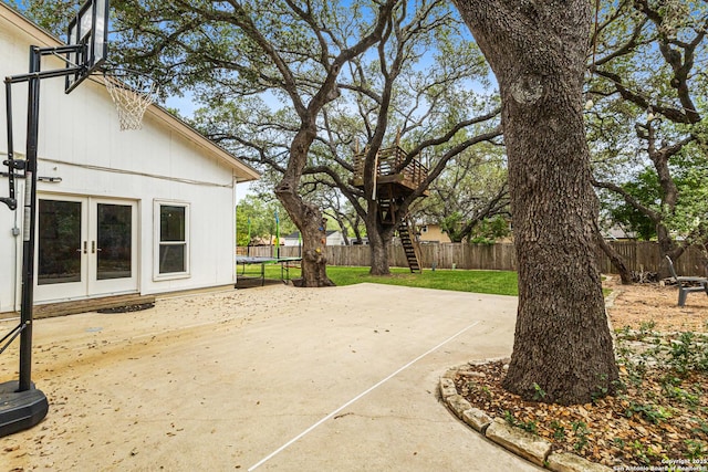 1946 Encino Belle, San Antonio, TX 78259 - fenced backyard featuring french doors and a patio