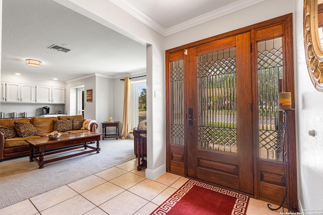 1946 Encino Belle, San Antonio, TX 78259 - entryway featuring light carpet, light tile patterned flooring, ornamental molding, and baseboards