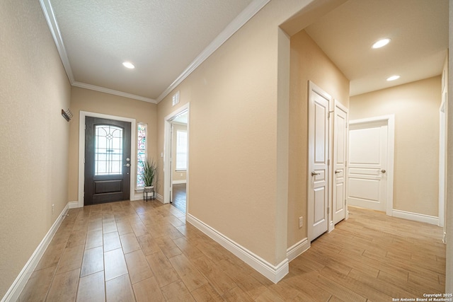 12827 Sabinal Riv, San Antonio, TX 78253 - foyer with light wood-type flooring, baseboards, ornamental molding, and recessed lighting