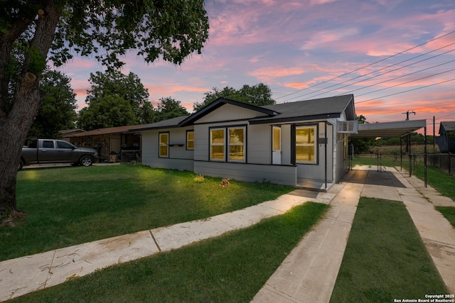142 W Palfrey, San Antonio, TX 78223 - single story home featuring driveway, a carport, and roof with shingles