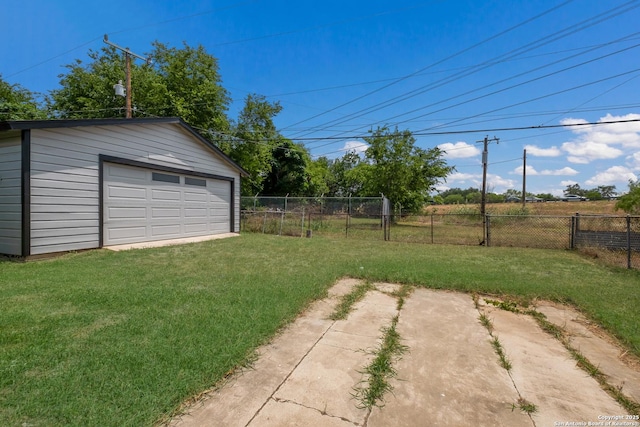 142 W Palfrey, San Antonio, TX 78223 - view of yard with a garage, an outdoor structure, and a patio