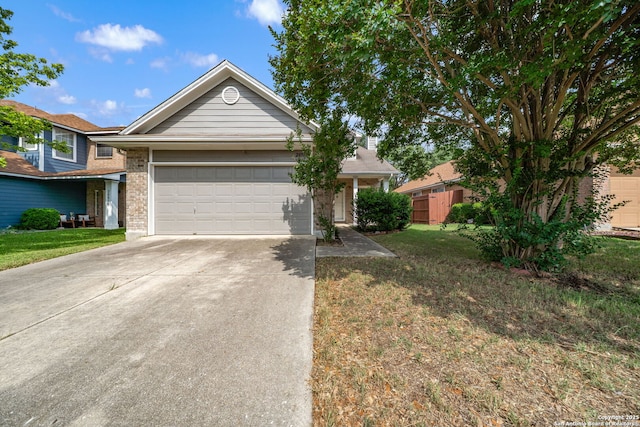 20519 View Mdw, San Antonio, TX 78258 - ranch-style house with concrete driveway, an attached garage, a front lawn, and brick siding