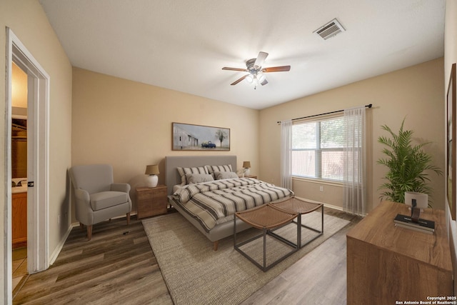 20519 View Mdw, San Antonio, TX 78258 - bedroom with wood finished floors, baseboards, and ceiling fan