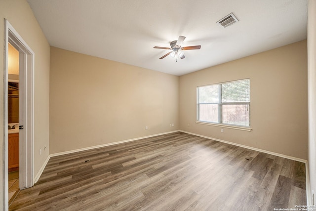 20519 View Mdw, San Antonio, TX 78258 - empty room featuring a ceiling fan, wood finished floors, and baseboards