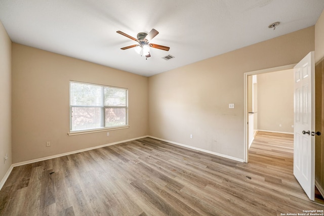 20519 View Mdw, San Antonio, TX 78258 - empty room featuring ceiling fan, wood finished floors, and baseboards