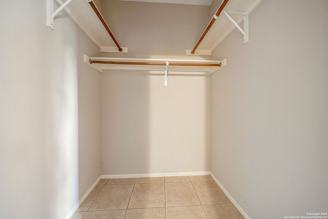 20519 View Mdw, San Antonio, TX 78258 - walk in closet with light tile patterned flooring