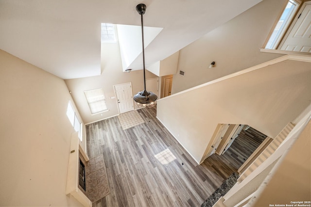 20519 View Mdw, San Antonio, TX 78258 - unfurnished living room with high vaulted ceiling and wood finished floors