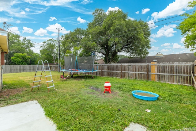 402 Teakwood, Victoria, TX 77901 - view of yard featuring a trampoline