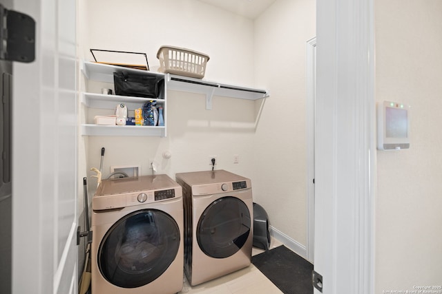 529 Huntwick, Boerne, TX 78006 - washroom featuring washing machine and dryer and tile patterned floors