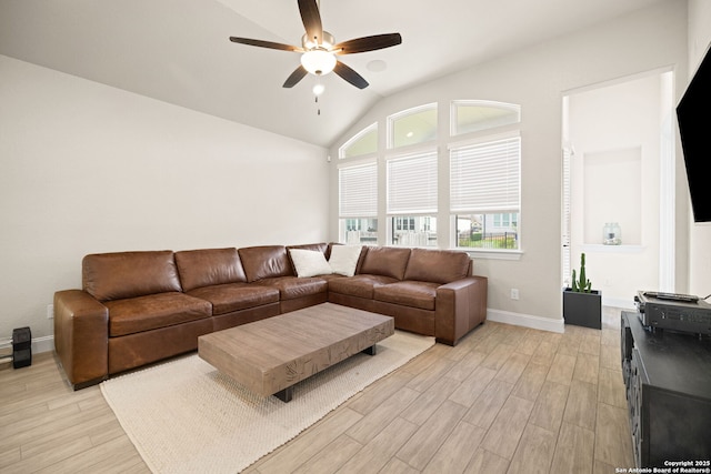 529 Huntwick, Boerne, TX 78006 - living area with a ceiling fan, light wood-type flooring, baseboards, and lofted ceiling