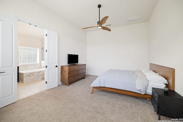 529 Huntwick, Boerne, TX 78006 - carpeted bedroom with ensuite bath and a ceiling fan
