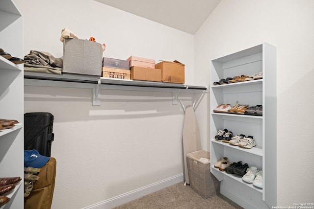 529 Huntwick, Boerne, TX 78006 - walk in closet with carpet and lofted ceiling