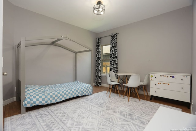 8955 Highland Dawn, San Antonio, TX 78254 - bedroom featuring wood finished floors and baseboards