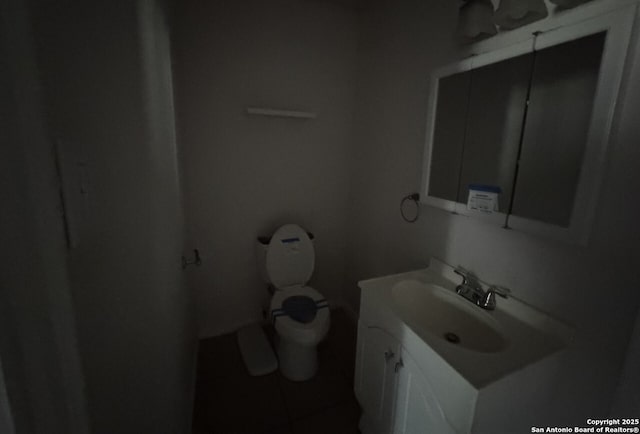 102 Killarney Dr, San Antonio, TX 78223 - bathroom featuring vanity, toilet, and tile patterned flooring