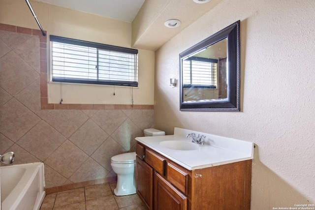 4503 Tropical, San Antonio, TX 78218 - bathroom featuring vanity, toilet, tile patterned floors, and  shower combination