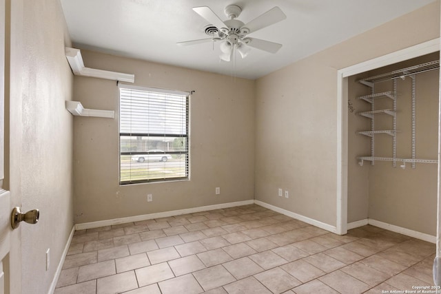 4503 Tropical, San Antonio, TX 78218 - unfurnished bedroom with tile patterned floors, a closet, ceiling fan, and baseboards