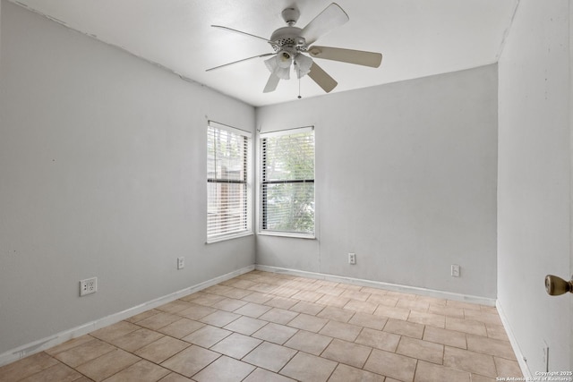 4503 Tropical, San Antonio, TX 78218 - tiled empty room with ceiling fan and baseboards