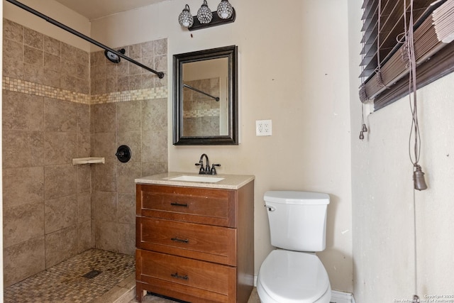 4503 Tropical, San Antonio, TX 78218 - bathroom with toilet, vanity, and a tile shower