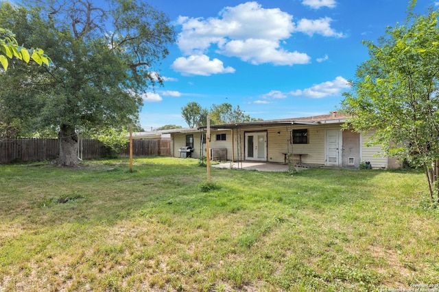 4503 Tropical, San Antonio, TX 78218 - rear view of house featuring a patio and french doors