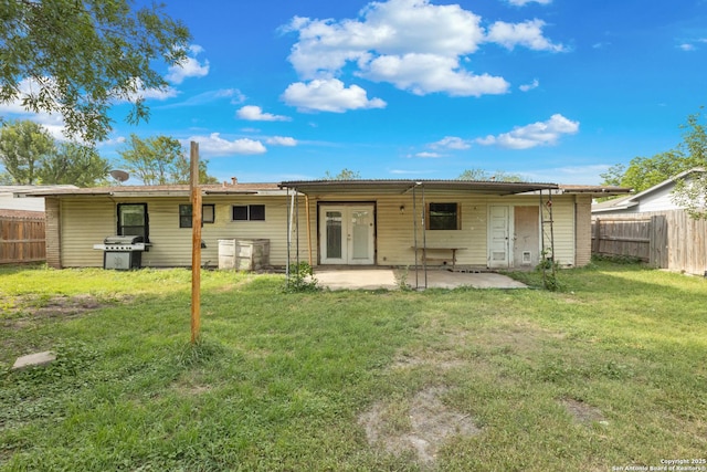 4503 Tropical, San Antonio, TX 78218 - back of house featuring french doors and a patio area