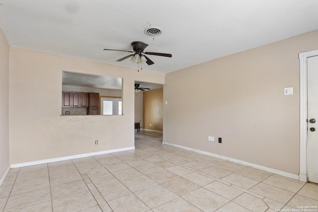 4503 Tropical, San Antonio, TX 78218 - empty room featuring ceiling fan, baseboards, and light tile patterned floors