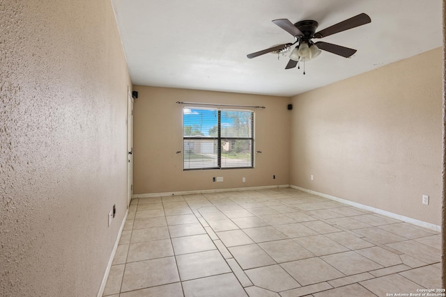 4503 Tropical, San Antonio, TX 78218 - unfurnished room with ceiling fan, light tile patterned flooring, and a textured wall