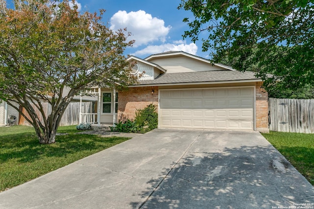 12215 Ridge Smt, San Antonio, TX 78247 - view of front facade featuring brick siding, concrete driveway, a garage, and a shingled roof