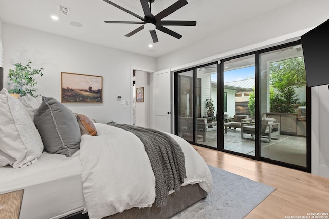 312 Frey, Boerne, TX 78006 - bedroom featuring access to outside, wood finished floors, recessed lighting, and ceiling fan
