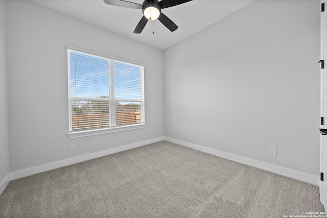 190 Azalea Aly, Castroville, TX 78009 - unfurnished room featuring light carpet, baseboards, ceiling fan, and vaulted ceiling