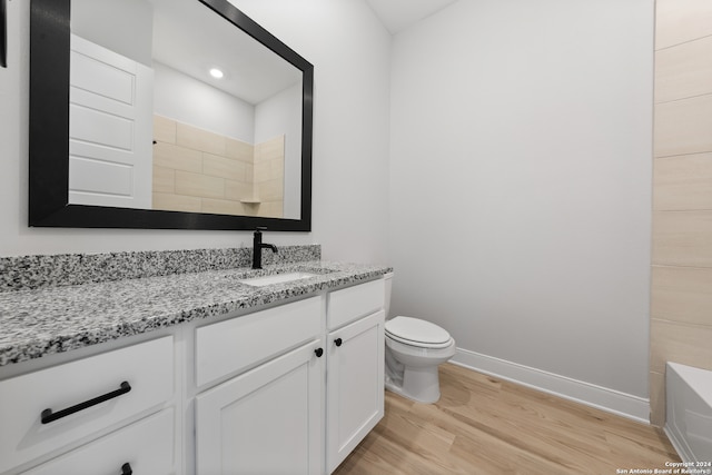 204 Azalea Aly, Castroville, TX 78009 - full bath with vanity, wood finished floors, toilet, and baseboards