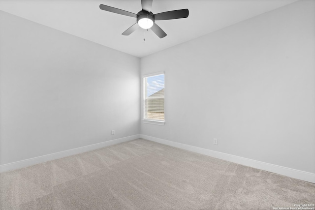 174 Azalea Aly, Castroville, TX 78009 - spare room featuring baseboards, light carpet, and ceiling fan