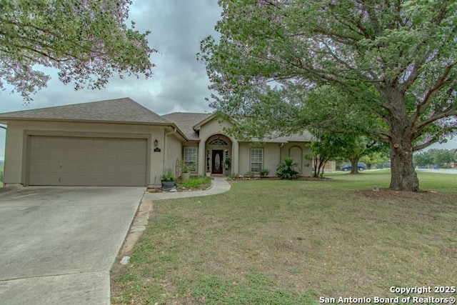 228 Long Crk, New Braunfels, TX 78130 - single story home with an attached garage, concrete driveway, stucco siding, and a front lawn