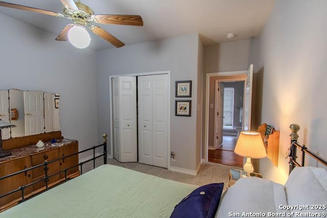 228 Long Crk, New Braunfels, TX 78130 - bedroom featuring carpet floors, a closet, baseboards, and ceiling fan